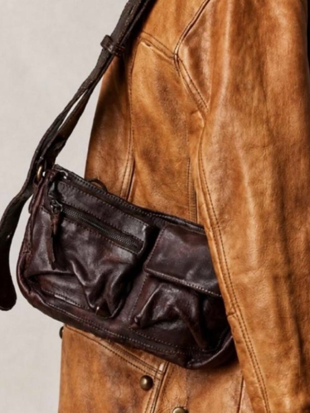 NWT Free People Wade Leather Sling Bag. Retail is $88. Color is “ cognac”.